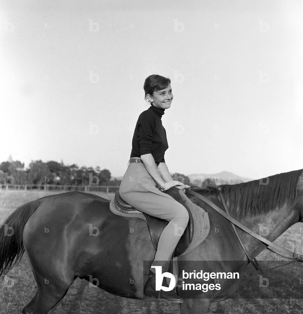 Audrey Hepburn on a field trip, Italy, 1956 (b/w photo)