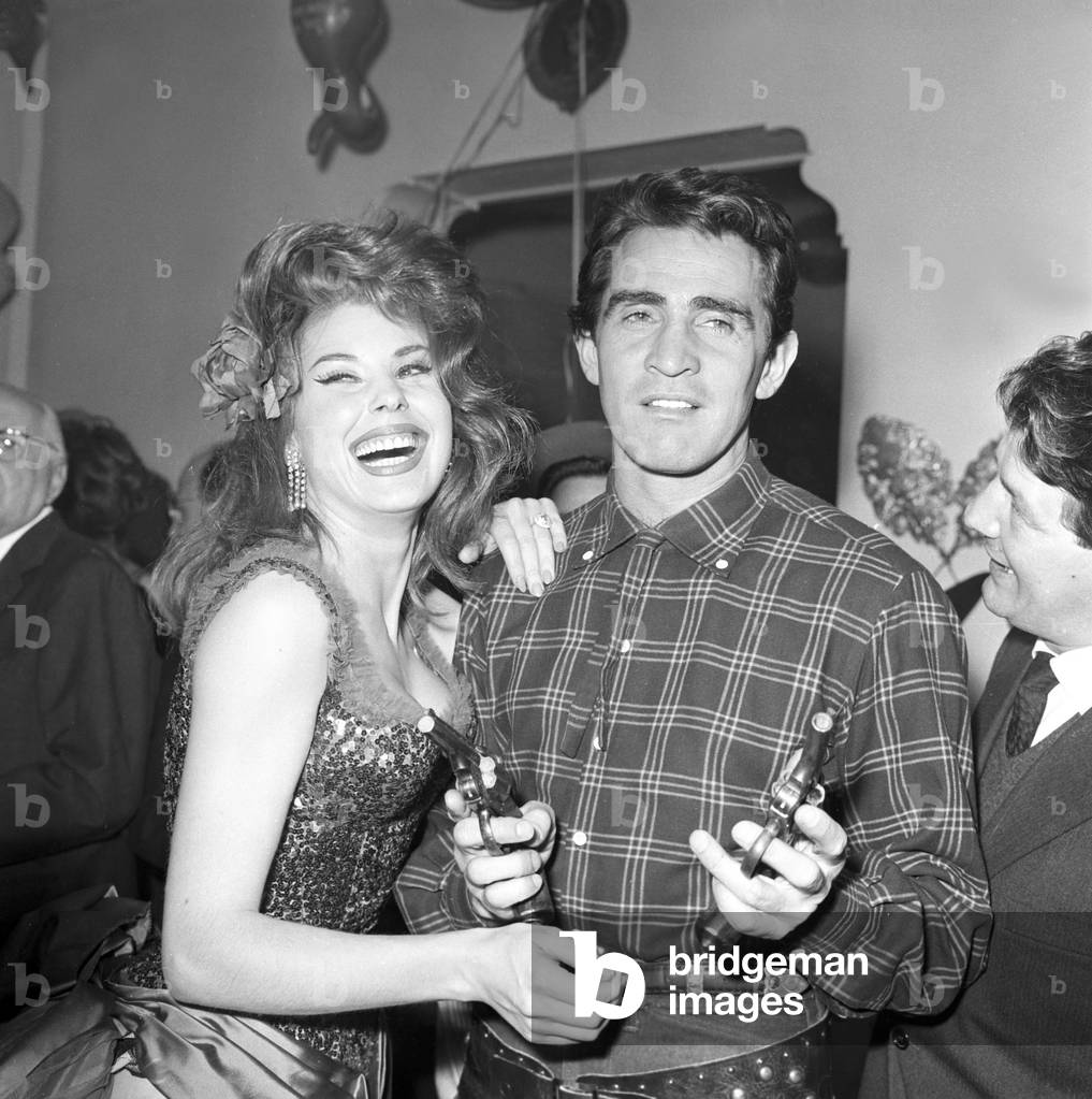 Walter Chiari and Dominique Boschero at a party, Italy, 1960 (b/w photo)