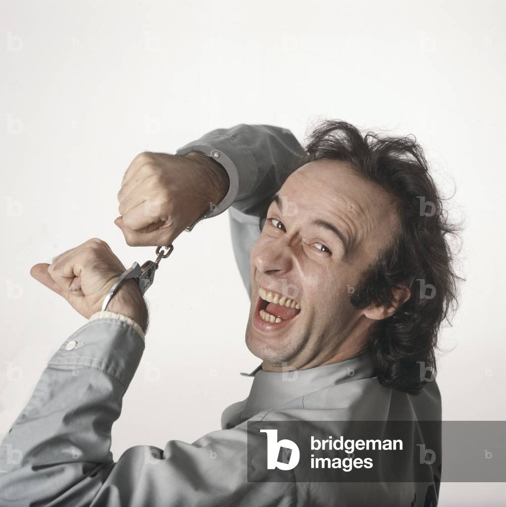 Roberto Benigni advertising Down by Law dressed as a prisoner, Italy, 1986