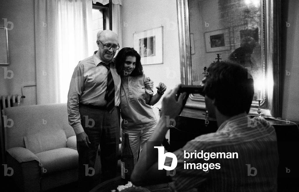 Slava Rostropovich hugging a girl