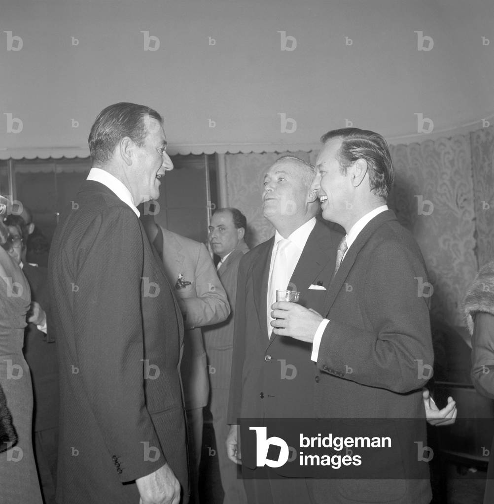 John Wayne and Henry Hathaway chatting (b/w photo)