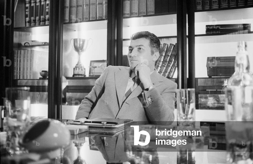 Ferruccio Lamborghini in his office, Italy, 1970 (b/w photo)