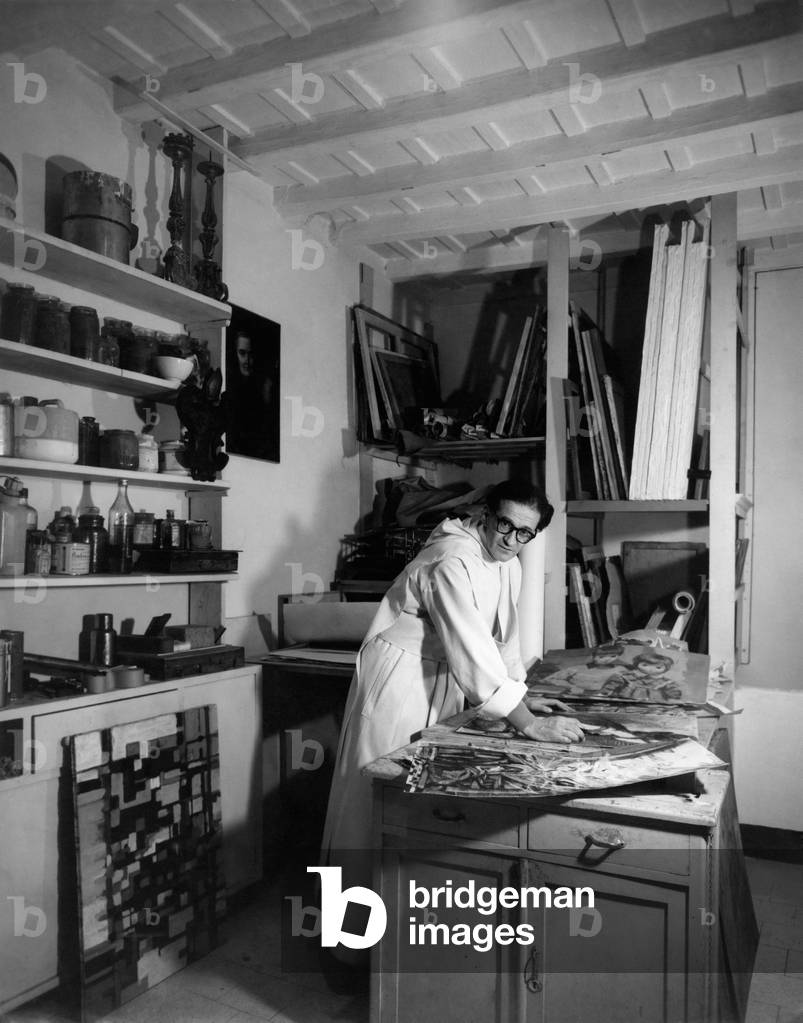Ambrogio Fumagalli in his atelier among his works