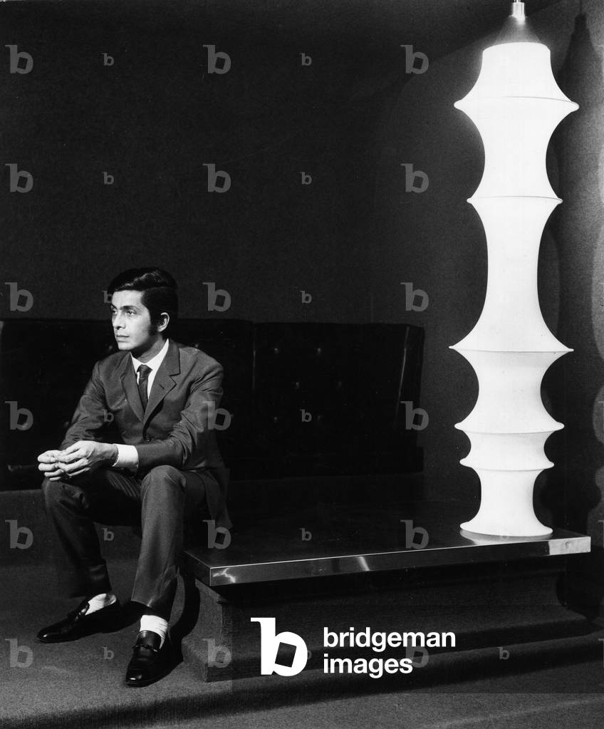 Valentino sitting in his atelier