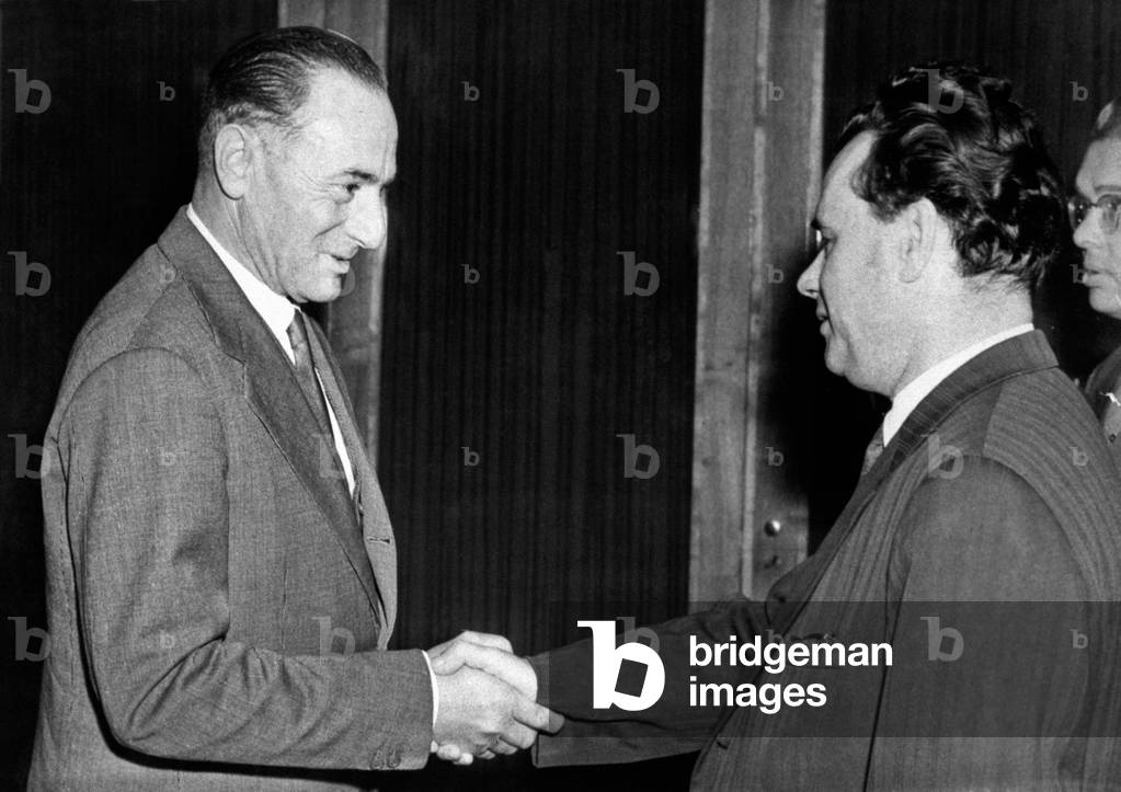 Enrico Mattei shaking hands with Nikolai Patolichev