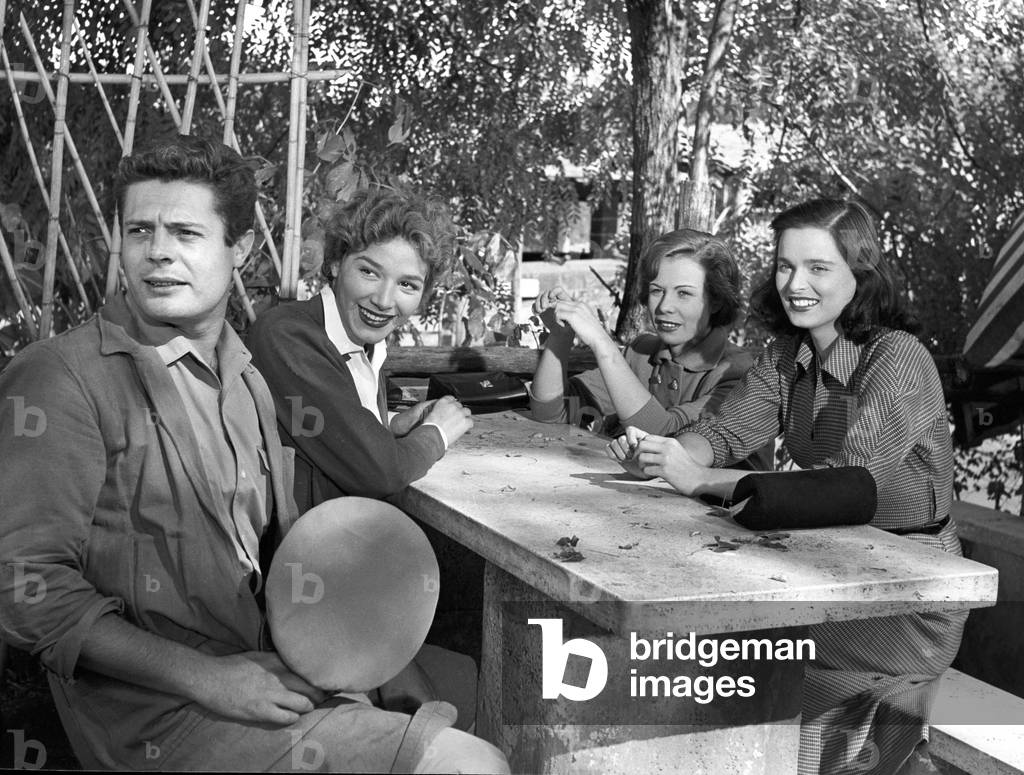Marcello Mastroianni, Lucia Bosè, Cosetta Greco and Liliana Bonfatti in the film Three Girls from Rome, Italy, 1951 (b/w photo)