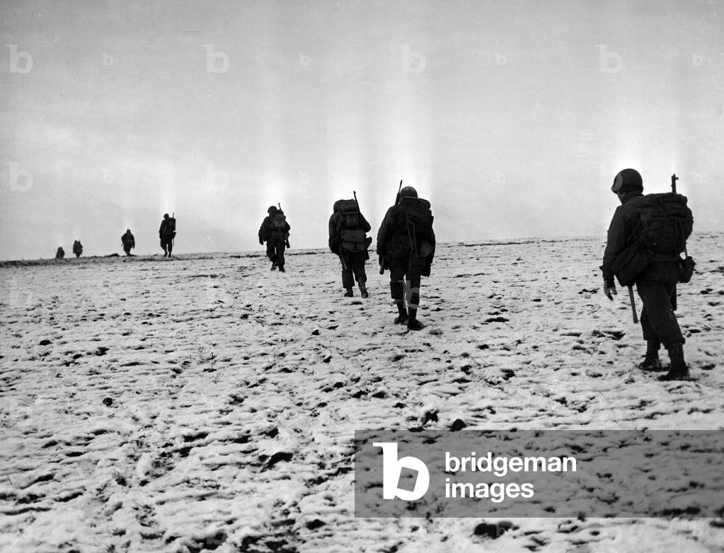 U.S. soldiers walking in a line