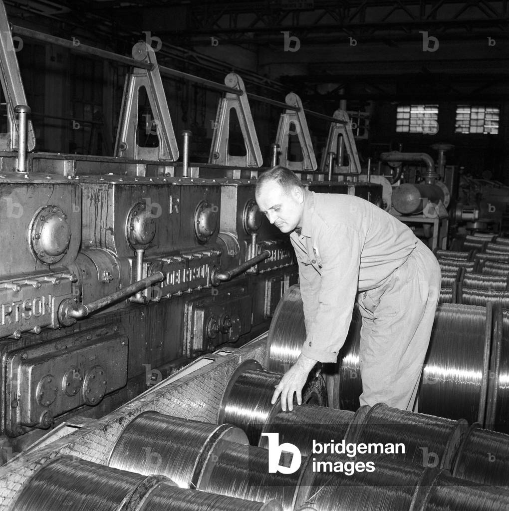 Mario Fari in the engine room, 1966 (b/w photo)