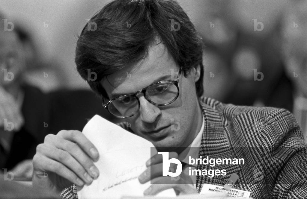 Renzo Lusetti checks the content of an envelope