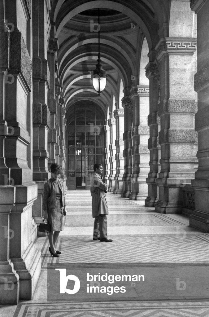Separated couple ignoring each other, Rome, Italy