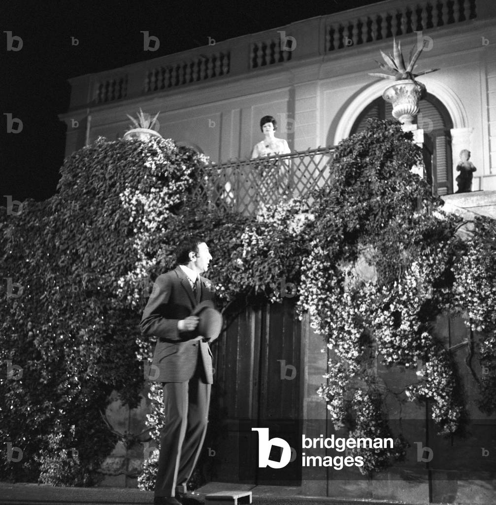 Italian TV host Pippo Baudo acting in a movie, Italy, 1969 (b/w photo)