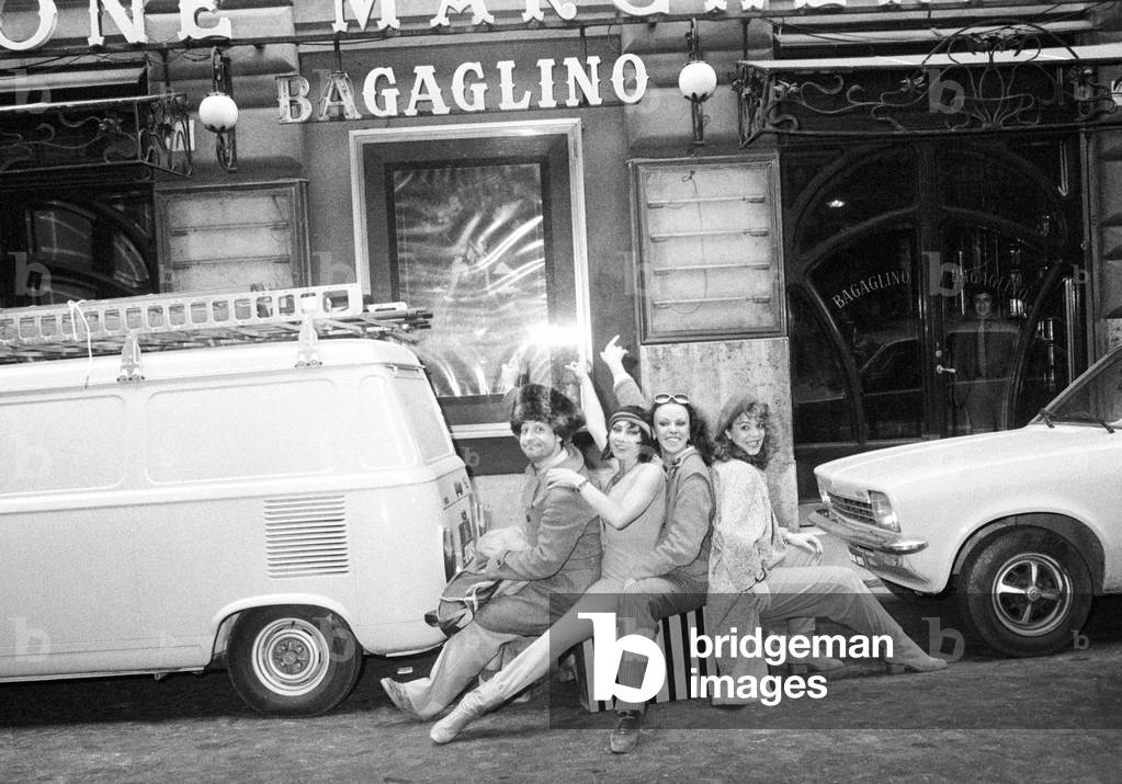 Leo Gullotta and Maria Grazia Buccella posing at the entrance of the Salone Margherita, Italy, 1973 (b/w photo)