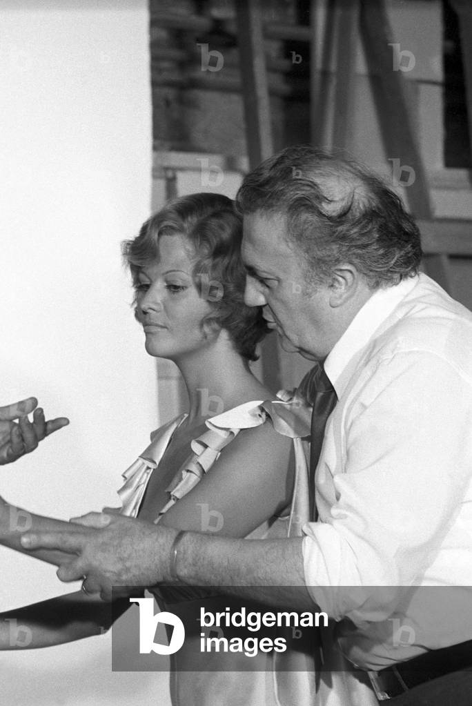 Federico Fellini and Claudia Cardinale on the phography set of Mandrake, Italy, 1972 (b/w photo)