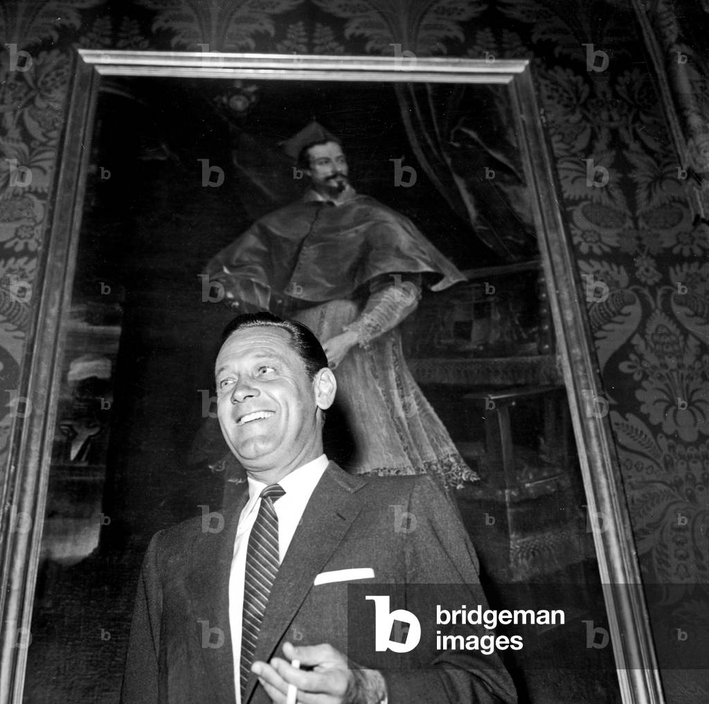 William Holden during a press conference, Rome, Italy, 1957 (b/w photo)