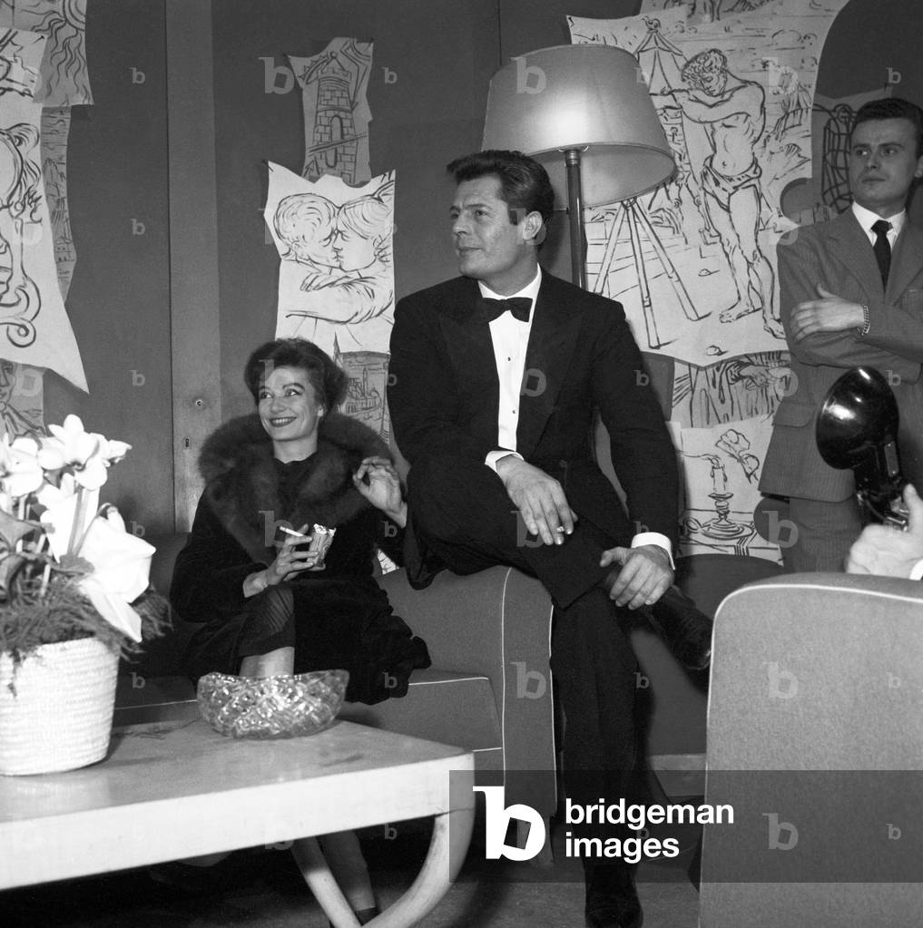 Marcello Mastroianni and Anouk Aimée at the premiere of the film La Dolce Vita, Italy, 1960 (b/w photo)