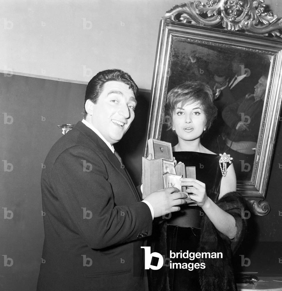 Mina and Tony Dallara at an award ceremony, Italy, 1960 (b/w photo)