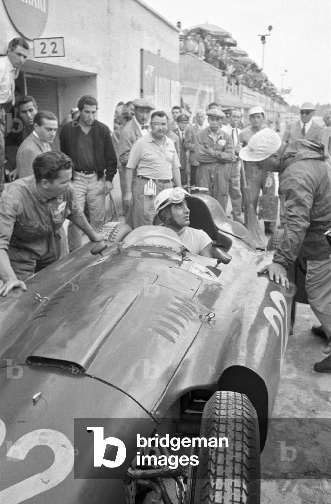 Italian car driver Eugenio Castellotti racing in the Italian Grand Prix on the Ferrari race car number 22, Monza, Italy, 2nd September 1956 (b/w photo)