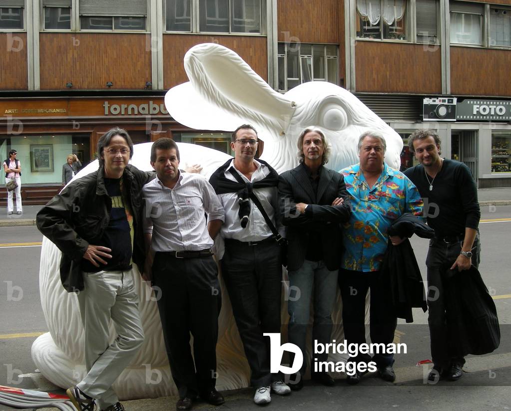 The members of Cracking Art Group: Renzo Nucara, Carlo Rizzetti, Marco Veronese, Alex Angi, Kicco and William Sweetlowe posing in front of a giant white rabbit made of non-toxic and recycled plastic (photo)