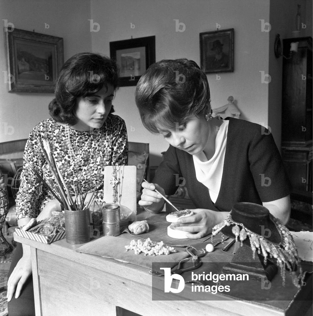 Two women making a jewel, Italy