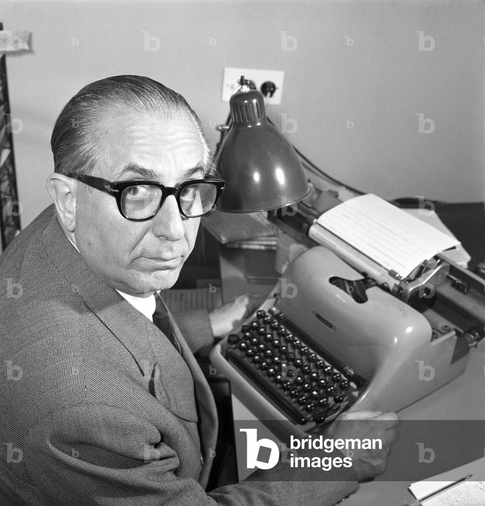 Enrico Mattei at the typewriter, Italy, 1961 (b/w photo)