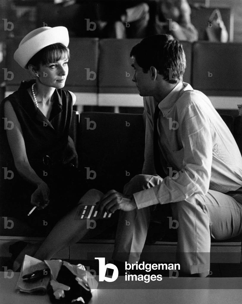 Audrey Hepburn and Anthony Perkins seated side by side , 1962 (b/w photo)