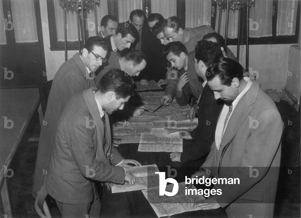 Activists of the Christian Democratic Party studying maps for the election campaign, Italy