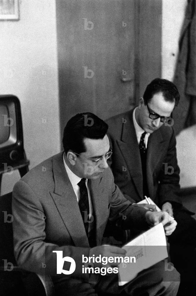 Arnaldo Forlani working with an assistant