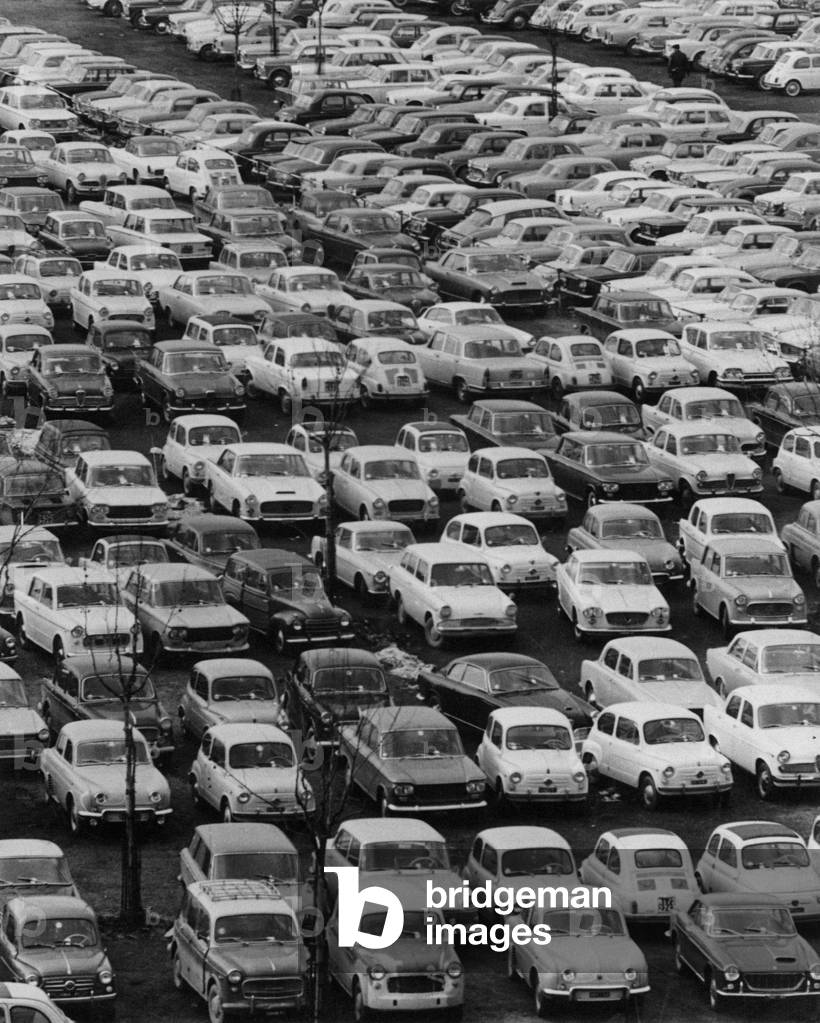 A parking full of cars, Milan, Italy
