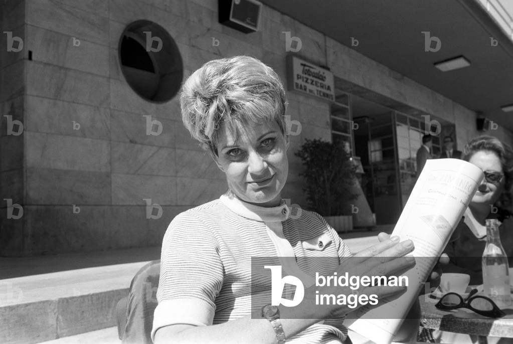 Alida Valli drinking coffee, Italy, 1968 (b/w photo)