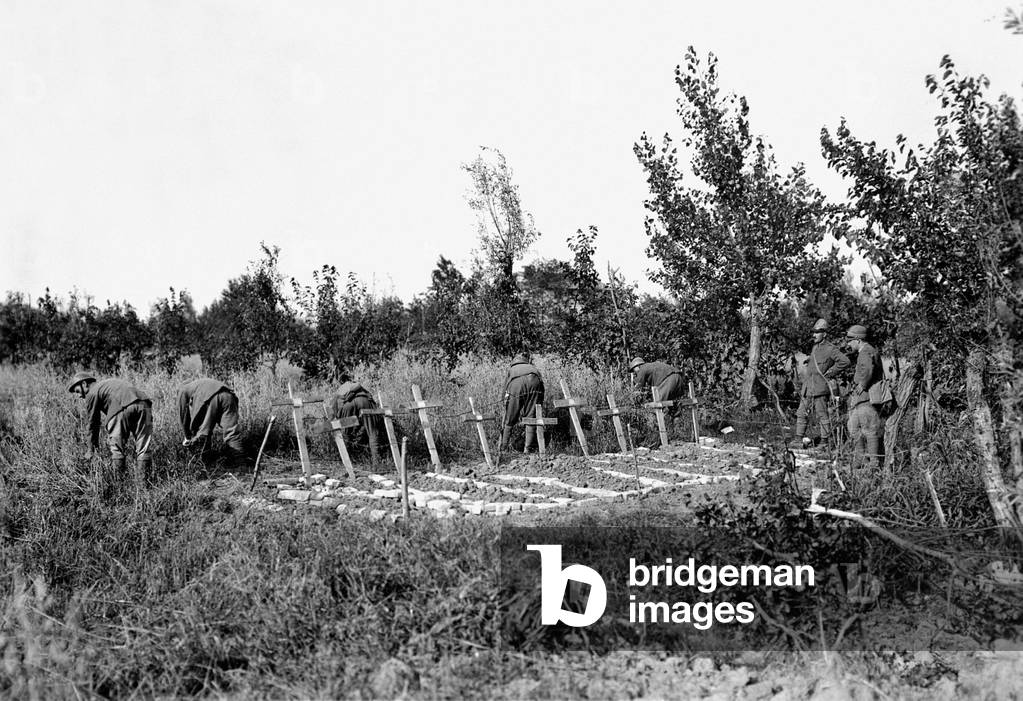 Soldiers harvesting the wheat