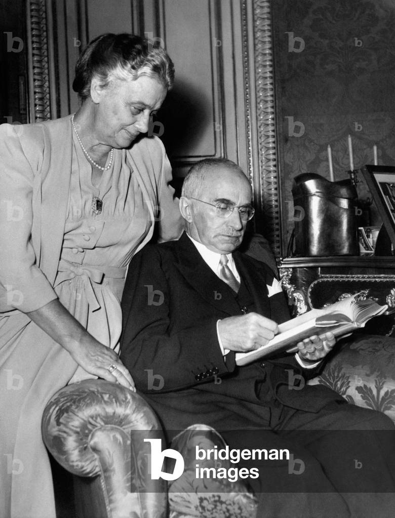 Luigi Einaudi and Ida Pellegrini sitting in an armchair