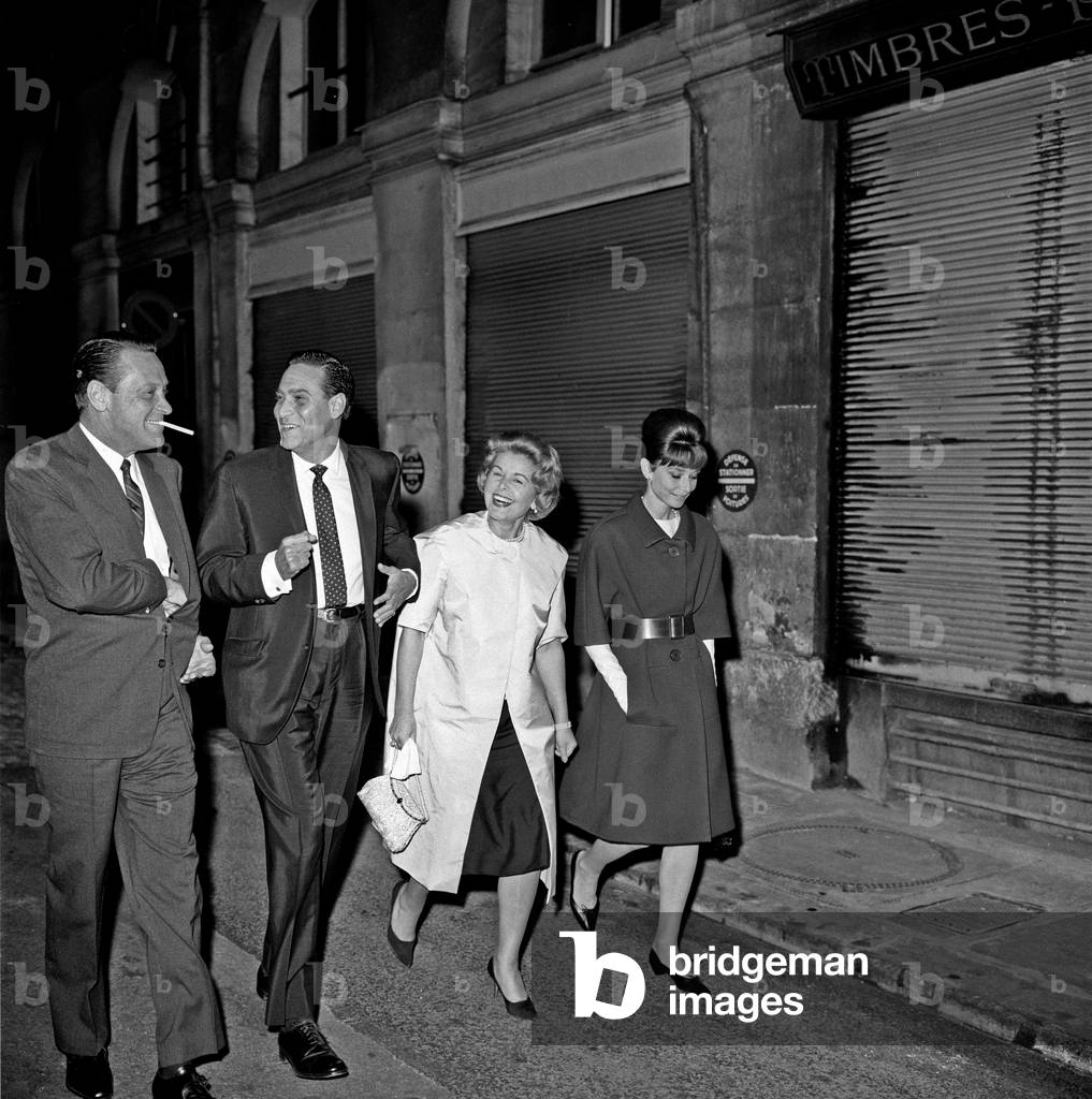 Audrey Hepburn, William Holden and Curd Jurgens walking in Paris, Paris, France, 1962 (b/w photo)