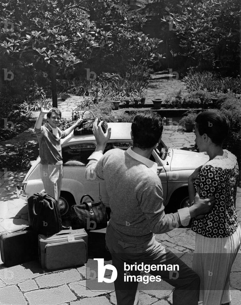The arrival of a guest with a lot of suitcases, Italy