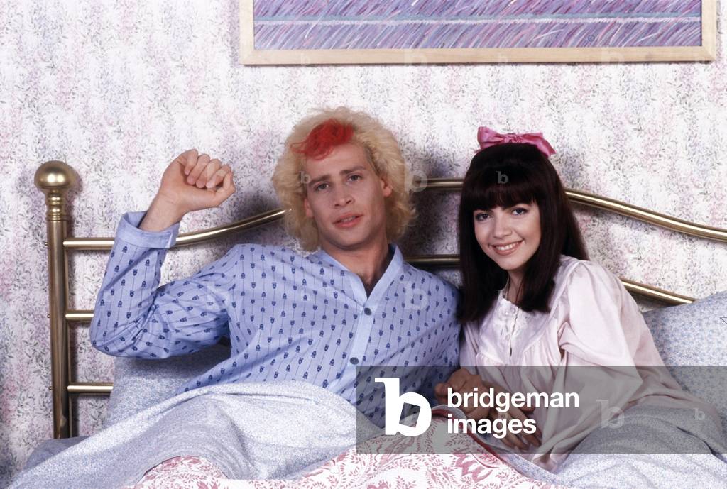 Pasquale Finicelli and Cristina D'Avena in bed in a fiction, Cologno Monzese, Italy