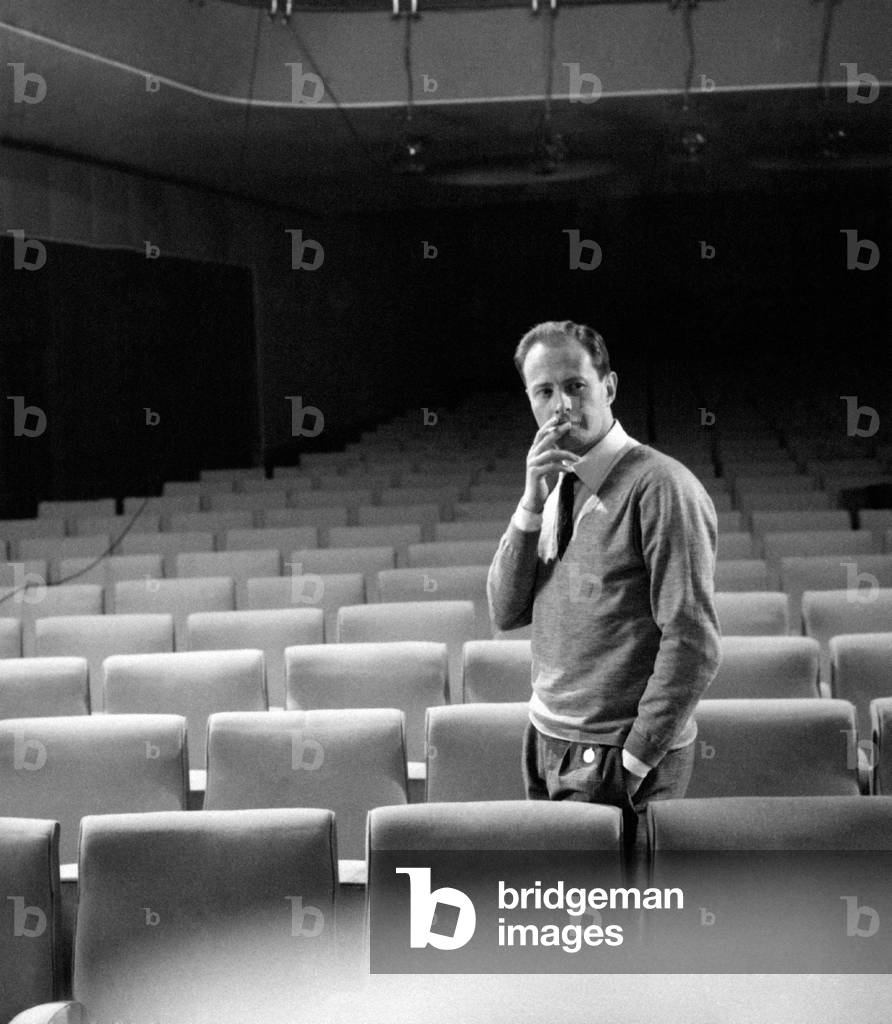 Mario Ferrero among the seats of a theatre
