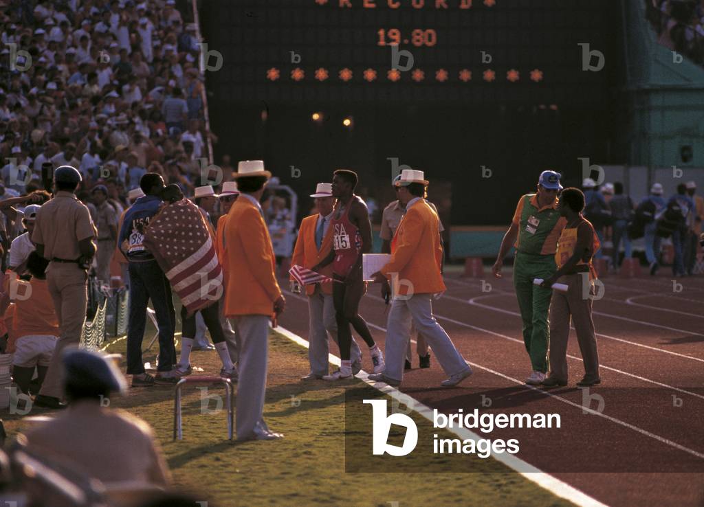 Carl Lewis celebrating the win, 1984 (photo)