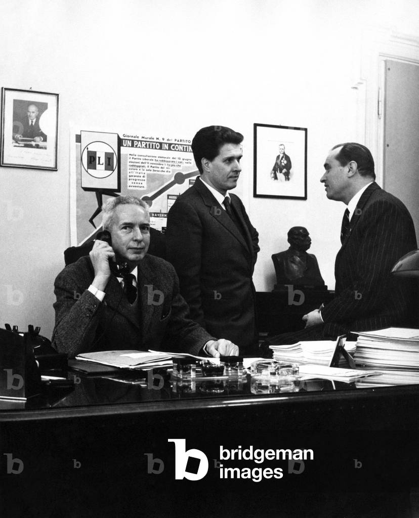 Augusto Premoli at the phone beside Umberto Bonaldi and Benedetto Cottone, Italy