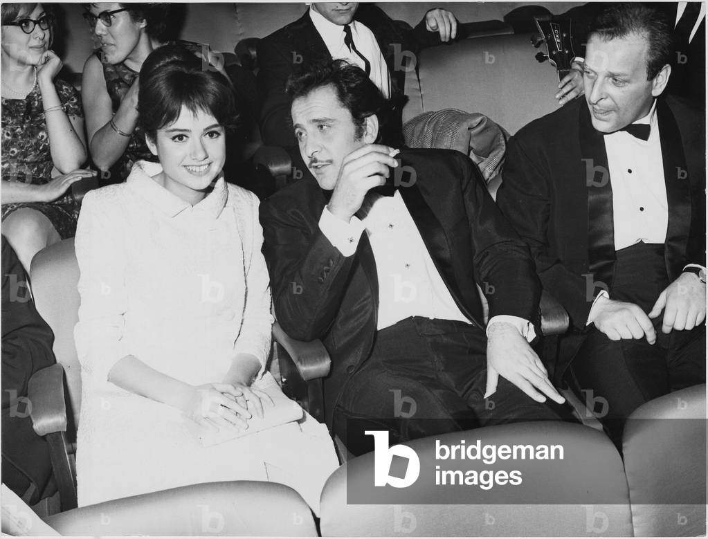Domenico Modugno sitting beside Gigliola Cinquetti at the 16th Sanremo Music Festival