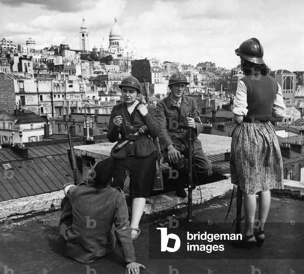 Partisans watching from the roofs of Paris, France