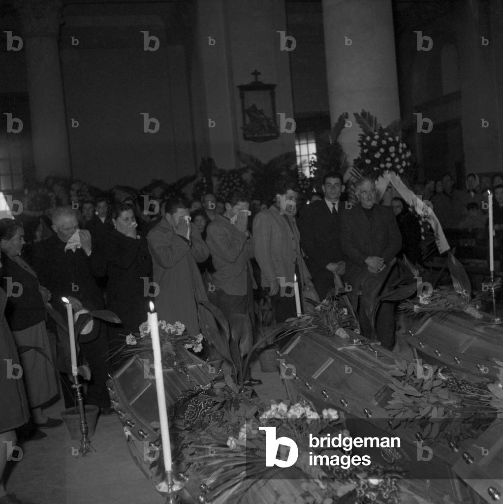 People crying at the funeral of the victims of Marcinelle, Manoppello, Italy