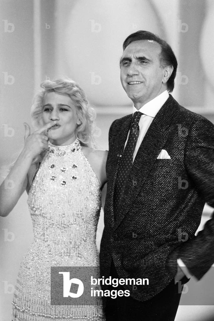 Pippo Baudo, Italian TV host, with Heather Parisi in Fantastico 5, Italy, 1984 (b/w photo)