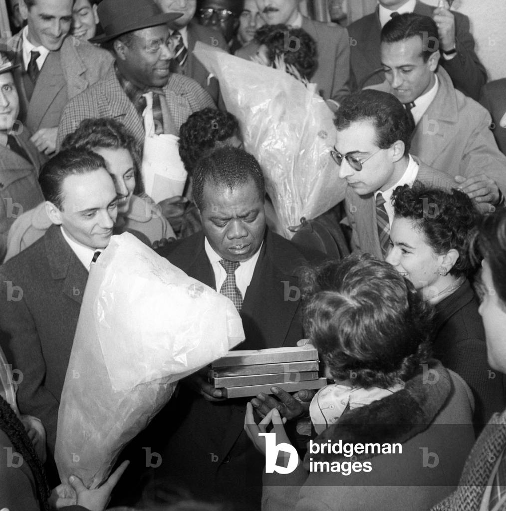 The crowd welcoming Louis Armstrong, Somma Lombardo, Italy, 1952