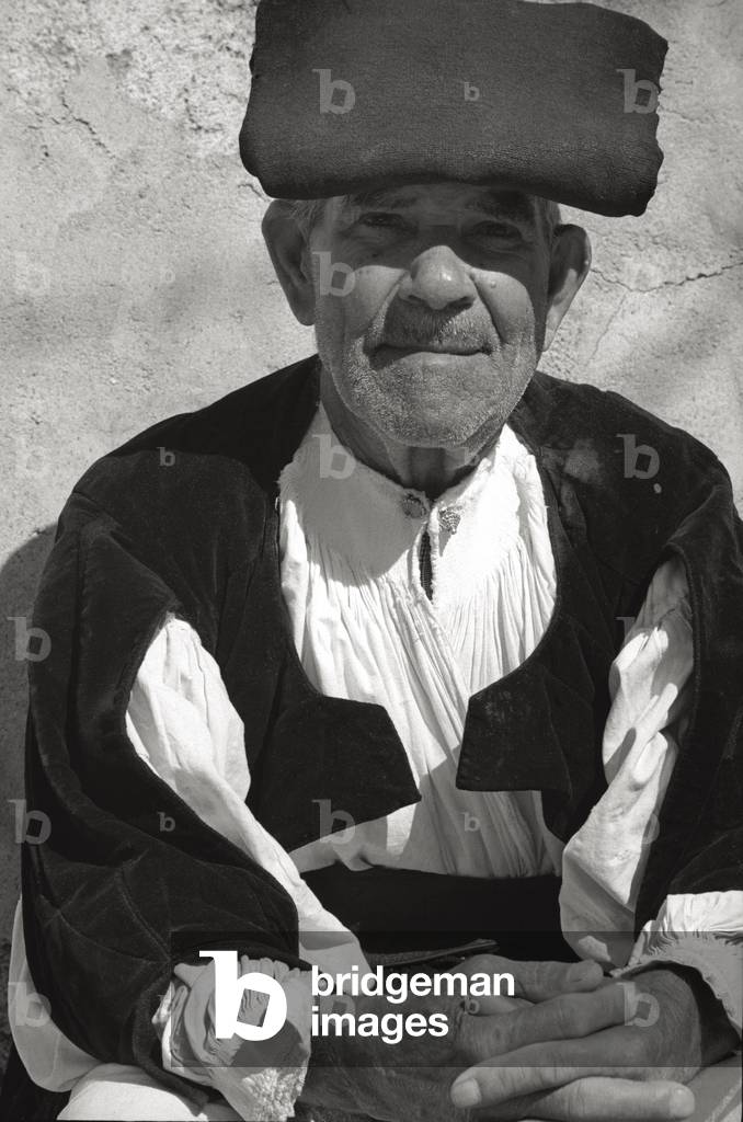 An old Sardinian shepherd wearing traditional clothes