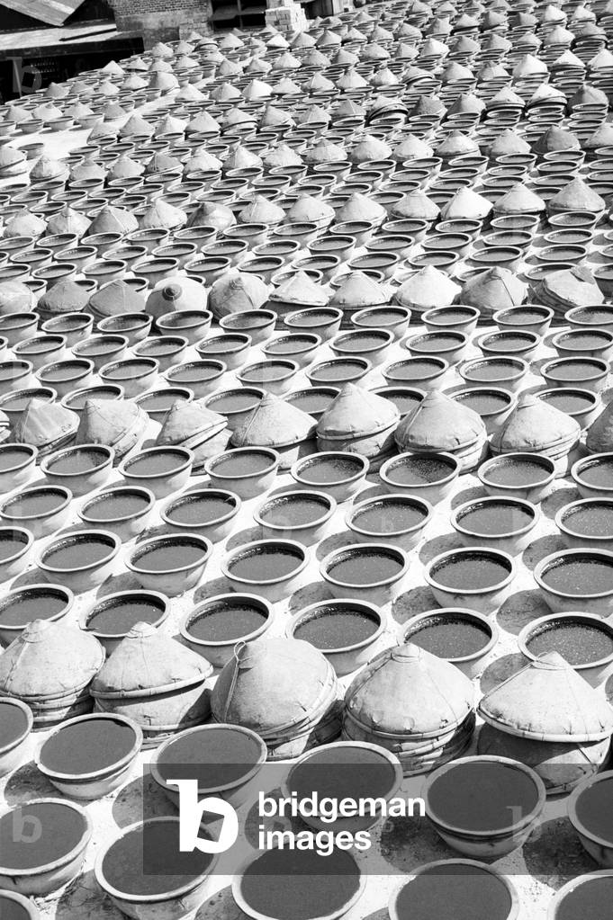 Vessels containing natural colours for fabrics, Hong Kong, 1950