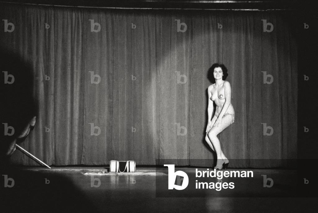 The last part of a striptease, Milan, Italy