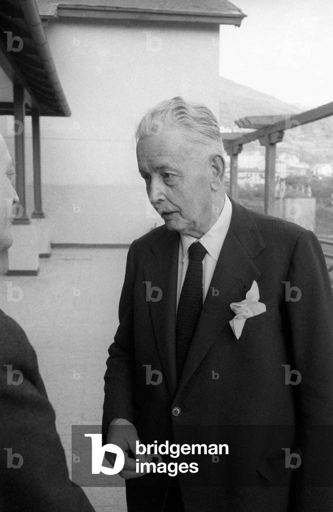 A racing car driver attending a meeting, Saint Vincent, Italy