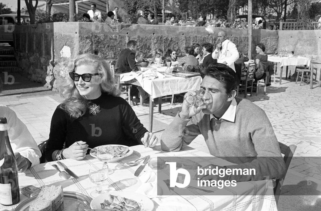 Walter Chiari and Anita Ekberg lunching outside, Italy, 1950 (b/w photo)