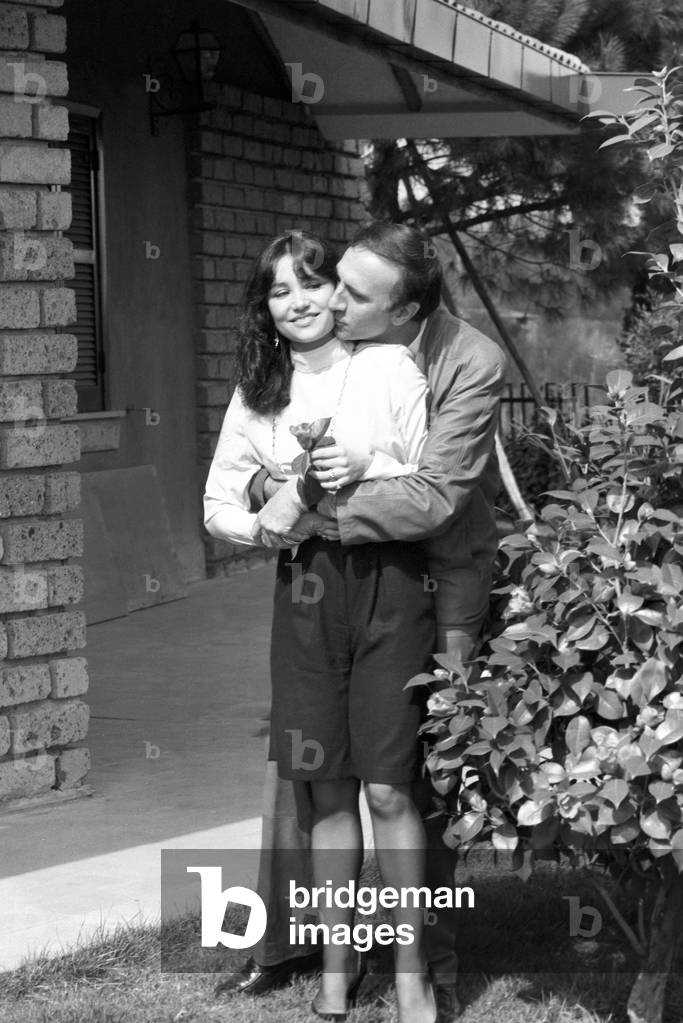 Pippo Baudo kissing Adriana Russo, Italy, 1981 (b/w photo)