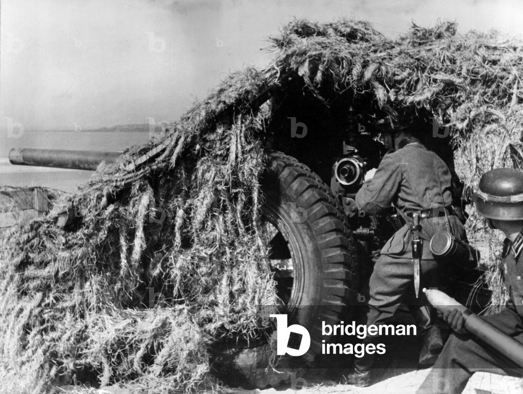 German artillerymen shooting