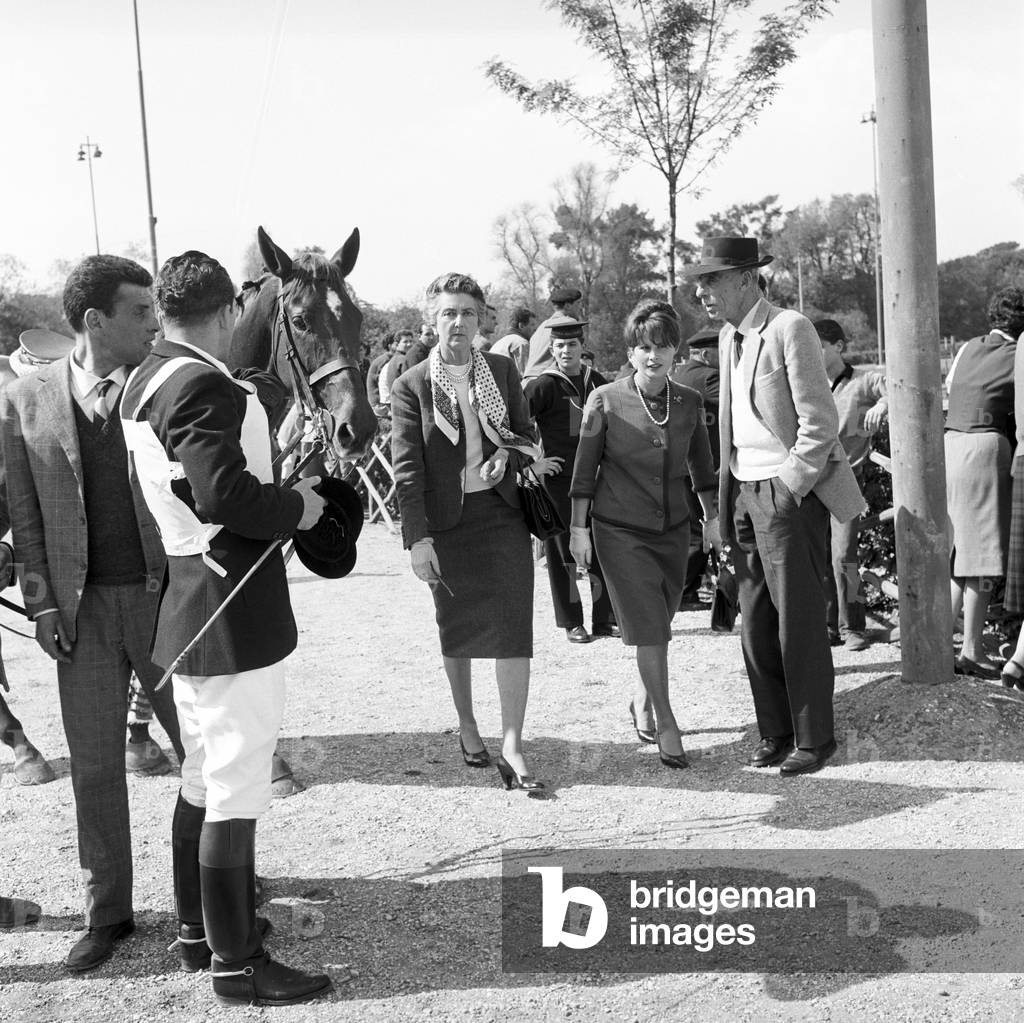 Marisa Allasio, Iolanda Margherita of Savoy and Giorgio Carlo Calvi di Bergolo at the hippodrome of Villa Borghese, Italy, 1962 (b/w photo)